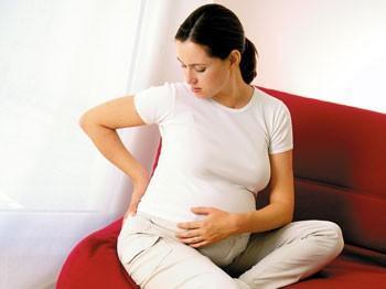 Боль в пояснице при беременности: причины, лечение