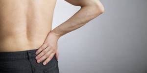 Боль в пояснице у мужчины: причины боли, ноющая, лечение спины